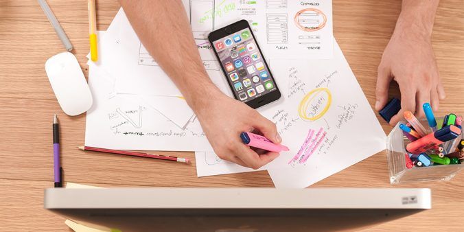 Person organising multiple documents