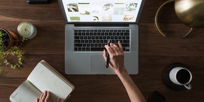 Typing on a laptop