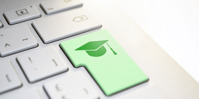 Computer keyboard: button with graduation cap highlighted